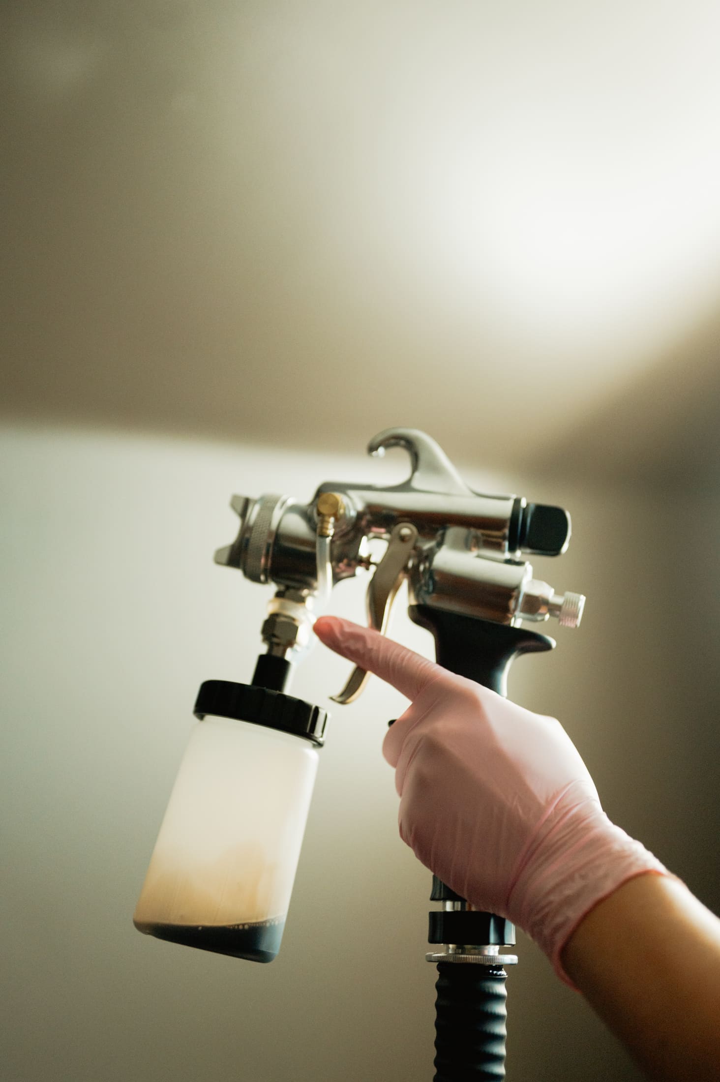 Spray tan solution and tools ready for application